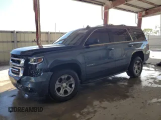 2020 Chevrolet Tahoe LS with VIN 1GNSCAKC0LR307589, listed as a Copart auction lot 44756085 with 66,339 mi miles and Salvage title. Bid and sale history available at DreamBid. Image 1.