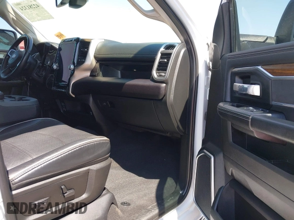 2023 Ram 2500 Laramie with VIN 3C6UR5FL2PG559276, listed as a IAAI auction lot 42281324 with 23,526 mi miles and . Bid and sale history available at DreamBid. Image 5.