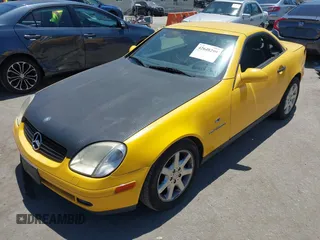 1999 Mercedes-Benz SLK 230/320 with VIN WDBKK47F7XF131839, listed as a IAAI auction lot 42648299 with 124,630 mi miles and . Bid and sale history available at DreamBid. Image 2.