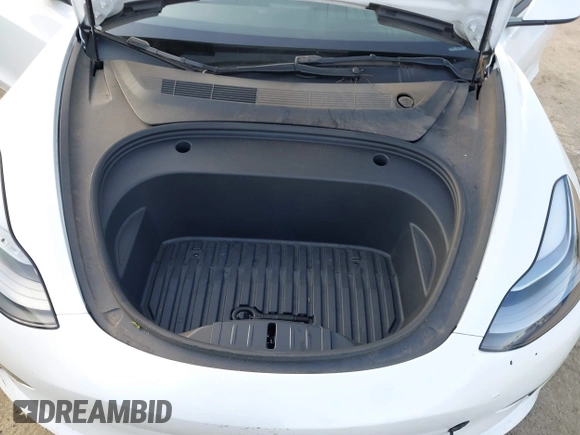 2022 Tesla Model 3 with VIN 5YJ3E1EA1NF167711, listed as a IAAI auction lot 41594266 with 50,554 mi miles and . Bid and sale history available at DreamBid. Image 10.