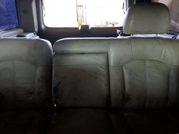2001 Chevrolet Tahoe LT z VIN 1GNEK13T41J114680, wystawiony jako Copart lot #58333525 z przebiegiem 223 591 mil mil oraz Szkoda całkowita • Salvage title. Historia ofert i sprzedaży dostępna na DreamBid. Obrazek 10.