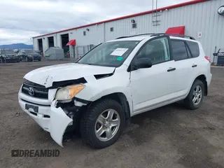 2010 Toyota RAV4 with VIN JTMBF4DVXAD029813, listed as a IAAI auction lot 41901574 with 102,596 mi miles. Bid and sale history available at carsss.com. Image 2.