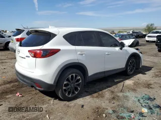 2016 Mazda CX-5 Grand Touring with VIN JM3KE2DY0G0888854, listed as a Copart auction lot 68379754 with 73,096 mi miles and Salvage Title. Bid and sale history available at carsss.com. Image 3.