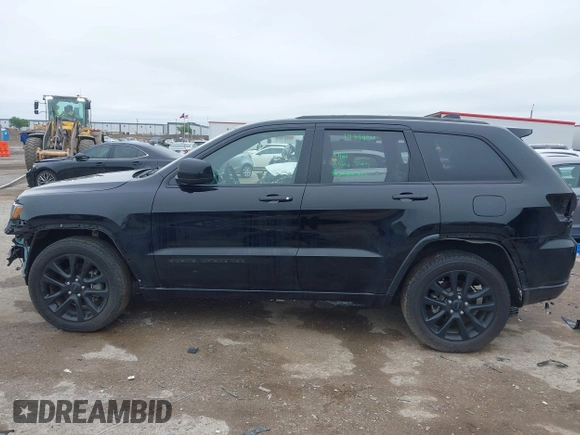 2018 Jeep Grand Cherokee Laredo E with VIN 1C4RJFAG5JC280033, listed as a IAAI auction lot 41953744 with 69,269 mi miles and . Bid and sale history available at DreamBid. Image 15.