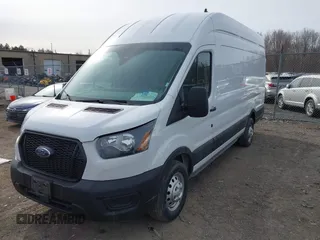 2023 Ford Transit Cargo with VIN 1FTBR3U80PKA70337, listed as a IAAI auction lot 41895248 with 51,430 mi miles and . Bid and sale history available at DreamBid. Image 17.