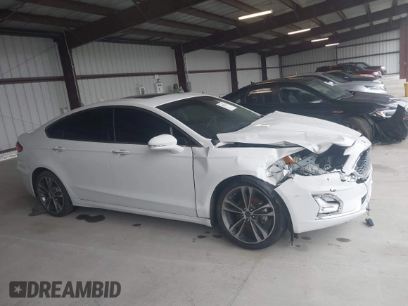 2019 Ford Fusion Titanium with VIN 3FA6P0K95KR271291, listed as a IAAI auction lot 41983320 with 71,962 mi miles and . Bid and sale history available at DreamBid. Image 13.