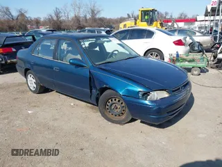1999 Toyota Corolla VE z VIN 2T1BR18E5XC188132, wystawiony jako IAAI lot #41773380 z przebiegiem 380 772 mil mil oraz . Historia ofert i sprzedaży dostępna na DreamBid. Obrazek 1.