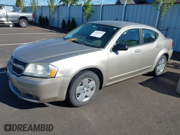2009 Dodge Avenger SE with VIN 1B3LC46B99N559410, listed as a IAAI auction lot 42051094 with 133,272 mi miles and . Bid and sale history available at DreamBid. Image 2.