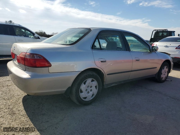 1999 Honda Accord Sdn LX with VIN 1HGCG1646XA013608, listed as a Copart auction lot 42612705 with 160,517 mi miles and Salvage Title. Bid and sale history available at carsss.com. Image 3.