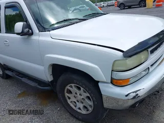 2003 Chevrolet Tahoe Z71 z VIN 1GNEK13Z23R230226, wystawiony jako IAAI lot #42252874 z przebiegiem 251 268 mil mil oraz . Historia ofert i sprzedaży dostępna na DreamBid. Obrazek 20.