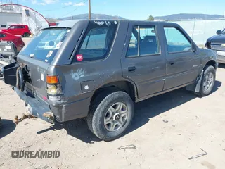 1997 Honda Passport z VIN 4S6CM58V4V4417753, wystawiony jako IAAI lot #42076610 z przebiegiem 211 410 mil mil oraz . Historia ofert i sprzedaży dostępna na DreamBid. Obrazek 4.