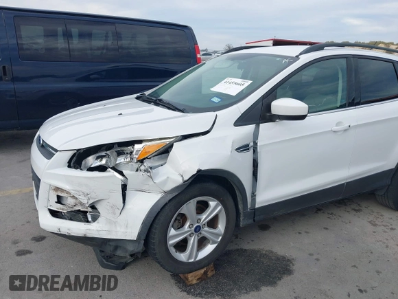 2015 Ford Escape SE with VIN 1FMCU0GX2FUB33893, listed as a IAAI auction lot 41455605 with 128,383 mi miles. Bid and sale history available at carsss.com. Image 17.