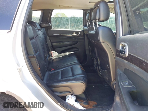 2011 Jeep Grand Cherokee Laredo with VIN 1J4RR4GG2BC737400, listed as a IAAI auction lot 42259167 with 153,211 mi miles and . Bid and sale history available at DreamBid. Image 8.