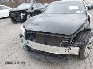 2013 Infiniti M z VIN JN1BY1AR9DM600490, wystawiony jako IAAI lot #41248655 z przebiegiem 125 167 mil mil oraz . Historia ofert i sprzedaży dostępna na DreamBid. Obrazek 6.