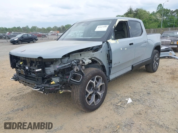 2023 Rivian R1T Adventure z VIN 7FCTGBAA6PN028520, wystawiony jako IAAI lot #42117498 z przebiegiem 24 583 mil mil oraz . Historia ofert i sprzedaży dostępna na DreamBid. Obrazek 20.