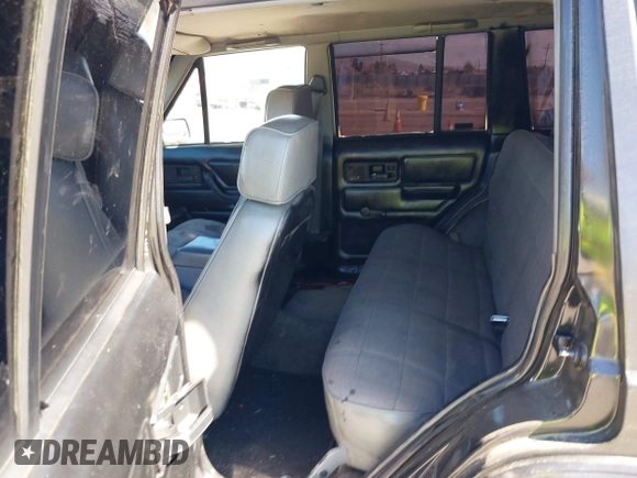 1994 Jeep Cherokee Sport with VIN 1J4FJ68S2RL175128, listed as a IAAI auction lot 41722936 with 345,700 mi miles and . Bid and sale history available at DreamBid. Image 8.