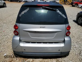 2009 Smart fortwo Pure with VIN WMEEJ31X49K224990, listed as a Copart auction lot 52111335 with 72,317 mi miles and Salvage Title. Bid and sale history available at carsss.com. Image 6.