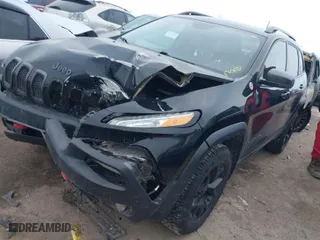 2018 Jeep Cherokee Trailhawk with VIN 1C4PJMBB6JD532865, listed as a IAAI auction lot 41362362 with 98,951 mi miles. Bid and sale history available at carsss.com. Image 2.