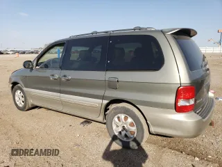 2005 Kia Sedona LX with VIN KNDUP132X56695902, listed as a Copart auction lot 73604104 with 109,676 mi miles and Salvage Title. Bid and sale history available at carsss.com. Image 2.