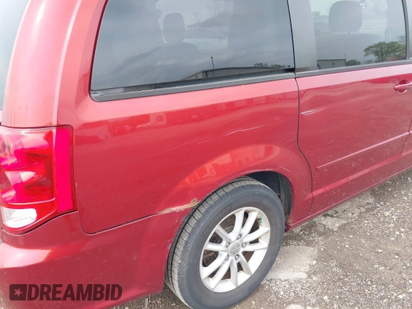 2014 Dodge Grand Caravan SXT with VIN 2C4RDGCG4ER120877, listed as a IAAI auction lot 42142083 with 199,895 mi miles and . Bid and sale history available at DreamBid. Image 6.