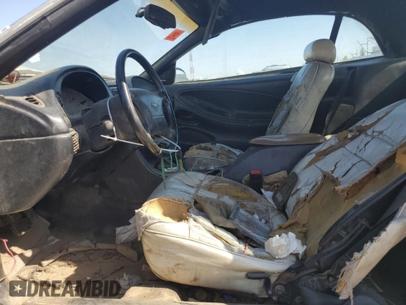 1998 Ford Mustang with VIN 1FAFP4448WF269580, listed as a Copart auction lot 54861155 with 304,869 mi miles and Salvage title. Bid and sale history available at DreamBid. Image 7.