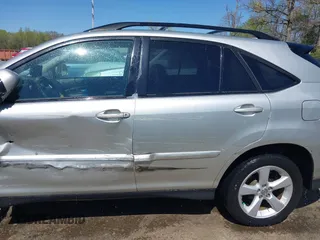 2006 Lexus RX 330 with VIN 2T2HA31U76C093953, listed as a IAAI auction lot 42057414 with 100,934 mi miles. Bid and sale history available at carsss.com. Image 14.