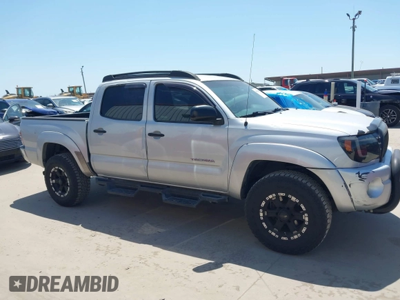 2010 Toyota Tacoma PreRunner z VIN 3TMJU4GN3AM098103, wystawiony jako IAAI lot #41981209 z przebiegiem 218 329 mil mil oraz . Historia ofert i sprzedaży dostępna na DreamBid. Obrazek 13.