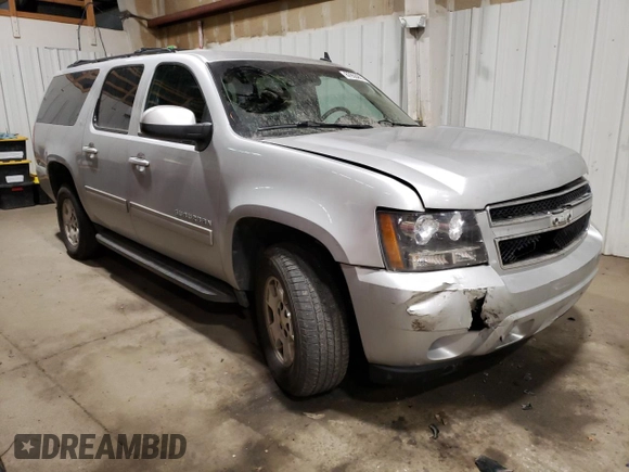 2013 Chevrolet Suburban LS with VIN 1GNSKHE72DR263672, listed as a Copart auction lot 87855905 with 124,081 mi miles and Salvage Title. Bid and sale history available at carsss.com. Image 4.