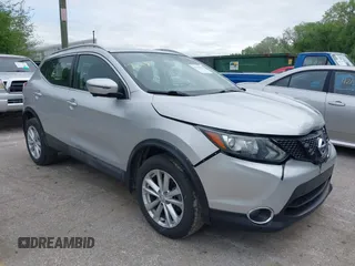 2017 Nissan Rogue SV z VIN JN1BJ1CP3HW007007, wystawiony jako IAAI lot #42110573 z przebiegiem 118 577 mil mil oraz . Historia ofert i sprzedaży dostępna na DreamBid. Obrazek 1.