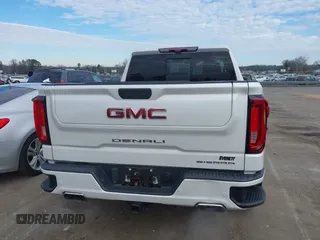 2020 GMC Sierra 1500 Denali z VIN 3GTU9FELXLG371258, wystawiony jako IAAI lot #41303490 z przebiegiem 63 571 mil mil oraz . Historia ofert i sprzedaży dostępna na DreamBid. Obrazek 16.