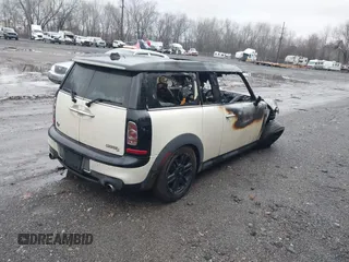 2012 MINI Clubman S with VIN WMWZG3C54CTY38530, listed as a IAAI auction lot 41575262 with 126,767 mi miles and . Bid and sale history available at DreamBid. Image 4.