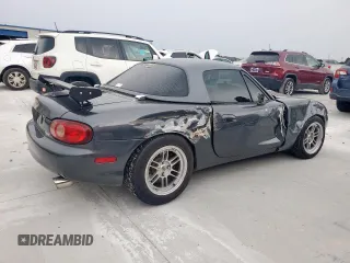 2001 Mazda MX-5 Miata with VIN JM1NB353210210976, listed as a Copart auction lot 59653695 with 152,250 mi miles and Salvage title. Bid and sale history available at DreamBid. Image 3.