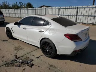 2021 Genesis G70 3.3T with VIN KMTG34LE3MU070581, listed as a Copart auction lot 77118004 with 96,280 mi miles and Salvage Title. Bid and sale history available at carsss.com. Image 2.