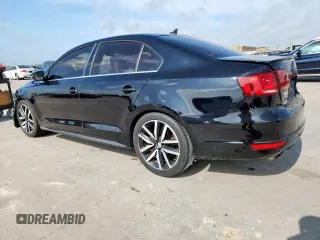2014 Volkswagen Jetta GLI Edition 30 z VIN 3VW4S7AJ1EM390796, wystawiony jako Copart lot #61292085 z przebiegiem 138 224 mil mil oraz Czysty tytuł • Clean title. Historia ofert i sprzedaży dostępna na DreamBid. Obrazek 2.