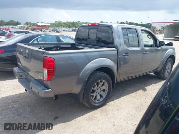 2020 Nissan Frontier SV with VIN 1N6ED0EA3LN715094, listed as a IAAI auction lot 42394885 with 26,576 mi miles and . Bid and sale history available at DreamBid. Image 4.