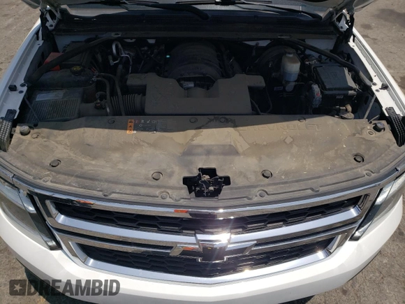 2019 Chevrolet Suburban LT with VIN 1GNSCHKCXKR207233, listed as a Copart auction lot 55410464 with 107,500 mi miles and Salvage Title. Bid and sale history available at DreamBid. Image 14.