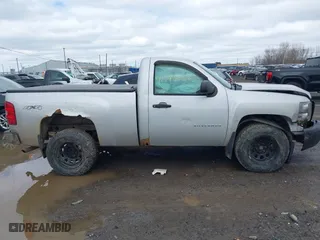 2011 Chevrolet Silverado 1500 Work Truck with VIN 1GCNKPEX8BZ243133, listed as a IAAI auction lot 41796052 with 123,709 mi miles. Bid and sale history available at carsss.com. Image 13.