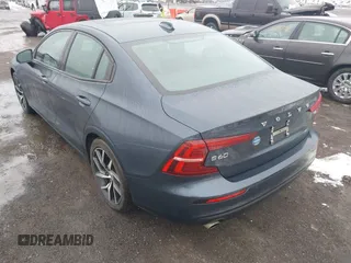 2019 Volvo S60 Momentum with VIN 7JRA22TK1KG014749, listed as a IAAI auction lot 41538244 with 68,224 mi miles. Bid and sale history available at carsss.com. Image 3.