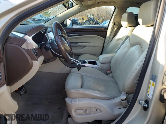 2014 Cadillac SRX Premium Collection z VIN 3GYFNGE34ES687663, wystawiony jako Copart lot #85854534 z przebiegiem 193 653 mil mil oraz Szkody całkowita. Historia ofert i sprzedaży dostępna na DreamBid. Obrazek 7.