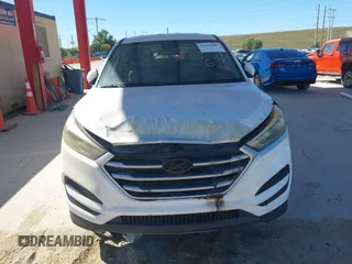 2017 Hyundai Tucson SE with VIN KM8J23A45HU328404, listed as a IAAI auction lot 41695180 with 120,458 mi miles. Bid and sale history available at carsss.com. Image 12.