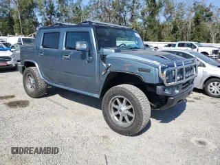 2007 Hummer H2 SUT with VIN 5GRGN22U87H100434, listed as a Copart auction lot 44107995 with 164,089 mi miles and Salvage Title. Bid and sale history available at carsss.com. Image 4.