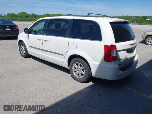2013 Chrysler Town & Country Touring with VIN 2C4RC1BG0DR585138, listed as a IAAI auction lot 42186087 with 205,152 mi miles and . Bid and sale history available at DreamBid. Image 3.