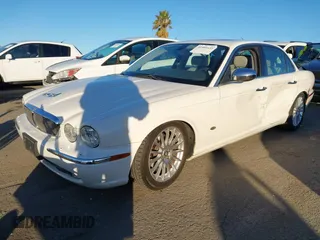 2007 Jaguar XJ with VIN SAJWA71B17SH12746, listed as a IAAI auction lot 41401422 with 99,735 mi miles. Bid and sale history available at carsss.com. Image 17.