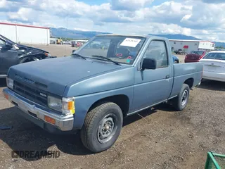 1989 Nissan Hardbody z VIN 1N6ND11S7KC338798, wystawiony jako IAAI lot #42328305 z przebiegiem 153 347 mil mil oraz . Historia ofert i sprzedaży dostępna na DreamBid. Obrazek 2.