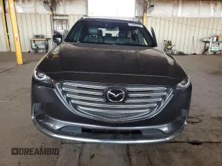 2016 Mazda CX-9 Grand Touring с VIN JM3TCADY3G0119947, выставлен на аукционе Copart как лот 57904515 с пробегом 94 251 миль миль и Списание • Salvage title. История ставок и продаж доступна на DreamBid. Изображение 5.