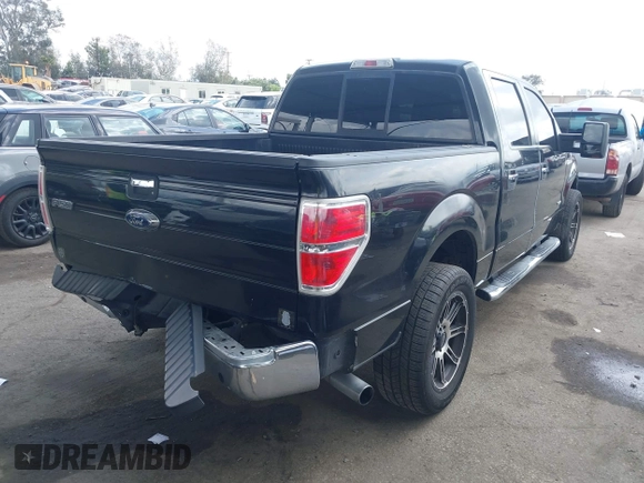 2014 Ford F-150 XL with VIN 1FTFW1CTXEKE56183, listed as a IAAI auction lot 41900304 with 94,597 mi miles and . Bid and sale history available at DreamBid. Image 4.
