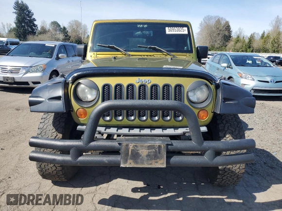 2008 Jeep Wrangler Unlimited X with VIN 1J4GA39118L528479, listed as a Copart auction lot 50953825 with 171,156 mi miles and Salvage Title. Bid and sale history available at carsss.com. Image 5.