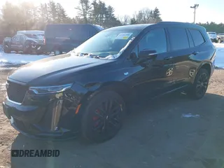 2024 Cadillac XT6 AWD Sport z VIN 1GYKPHRS4RZ700307, wystawiony jako IAAI lot #41257556 z przebiegiem 18 292 mil mil oraz . Historia ofert i sprzedaży dostępna na DreamBid. Obrazek 17.