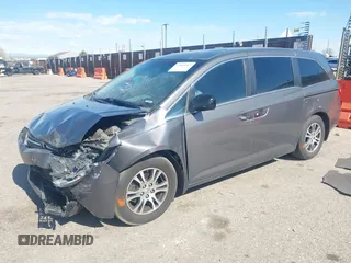 2012 Honda Odyssey EX-L with VIN 5FNRL5H61CB095789, listed as a IAAI auction lot 42065507 with 138,570 mi miles and . Bid and sale history available at DreamBid. Image 17.