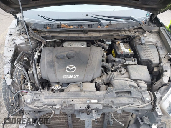 2016 Mazda CX-5 Touring with VIN JM3KE4CY5G0695242, listed as a IAAI auction lot 41795135 with 195,162 mi miles. Bid and sale history available at carsss.com. Image 10.